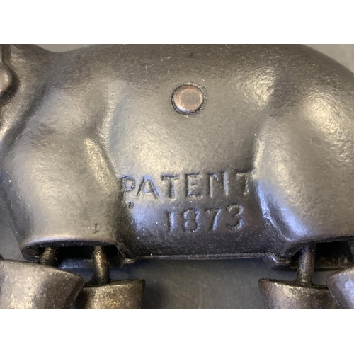 219 - A late 19th Century cast iron walking elephant toy, marked 'Patent 1873', most likely made by the Iv... 