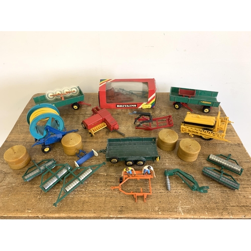 228 - A selection of vintage Britains farm accessories (all with playwear)