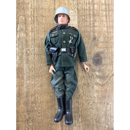 237 - A vintage dated 1964 Action Man figure in German uniform (some playwear)