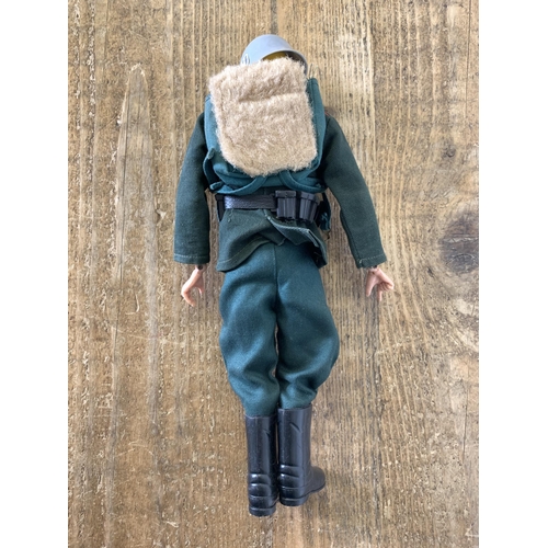 237 - A vintage dated 1964 Action Man figure in German uniform (some playwear)