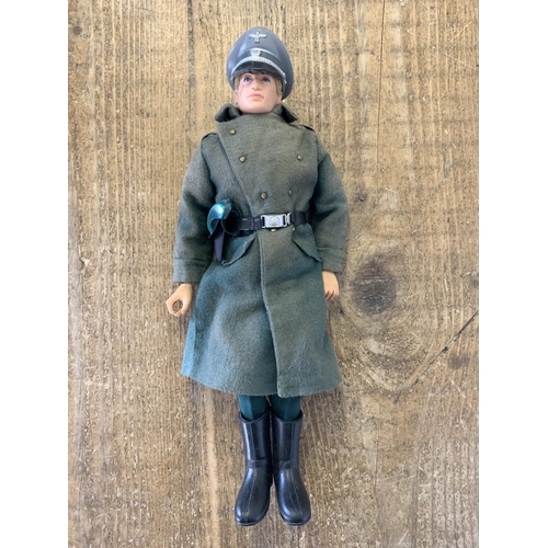 238 - A vintage dated 1964 Action Man figure in German uniform (some playwear, goggles broken)