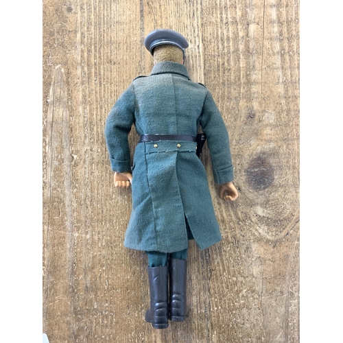 238 - A vintage dated 1964 Action Man figure in German uniform (some playwear, goggles broken)