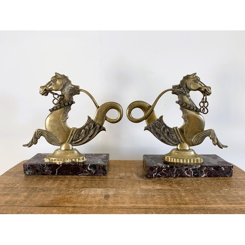 25 - A pair of vintage solid brass Venetian gondola seahorses mounted on marble style bases, 10 3/4