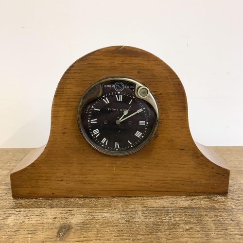 259 - Jaeger Paris 1920's/30's car clock mounted in a wooden case, marked 'BREV SGDG Jaeger Paris' to top,... 