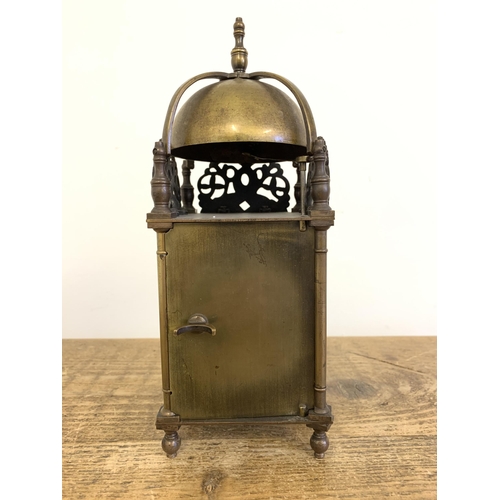 260 - An antique brass lantern clock with a French 8 day striking movement, marked J P on back plate for J... 