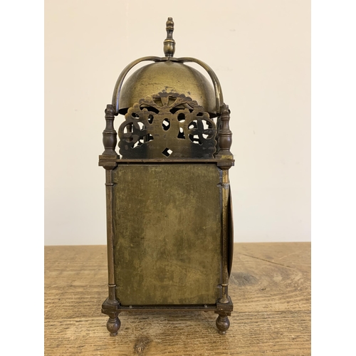 260 - An antique brass lantern clock with a French 8 day striking movement, marked J P on back plate for J... 