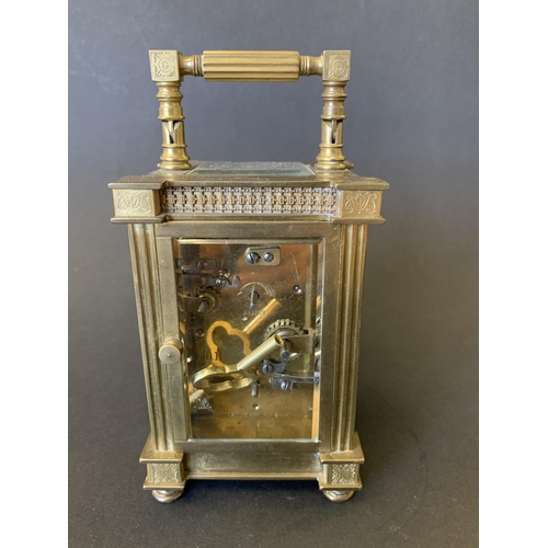 263 - A small antique ornate brass carriage clock with key, French movement marked J P for Japy Freres on ... 