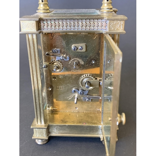 263 - A small antique ornate brass carriage clock with key, French movement marked J P for Japy Freres on ... 