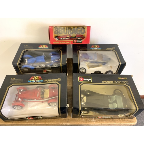 276 - Four boxed Burago 1:18 scale die cast vehicles including a Jaguar, Bugatti and Alfa plus a smaller A... 