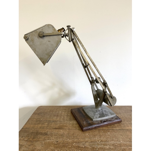 277 - A vintage Horstmann 'Pluslite' Anglepoise lamp with flip out magnifying glass, approx. 19