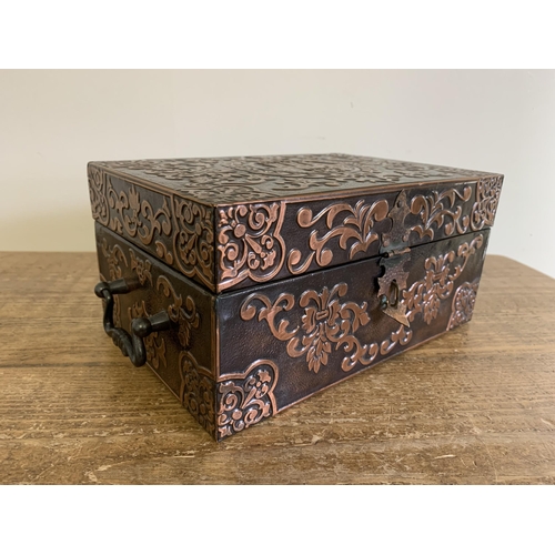 279 - An ornate metal covered box with 'Krakow' on top, 9 3/4