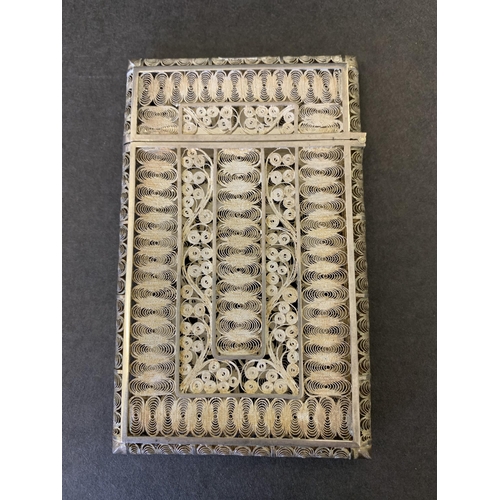 285 - An antique white metal intricate filigree work card case in original box, named Bull Black & Co Broa... 