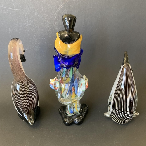 30 - Two hand blown glass figurines, penguin and duck plus a Murano style glass clown (as found to one fi... 