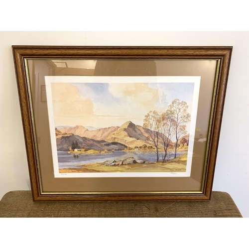 300 - A framed and glazed print of a mountain scene, artist signed by Jack Green, limited edition 52/750, ... 