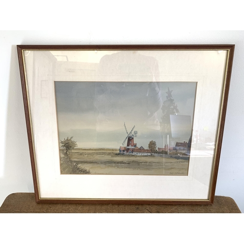 314 - A framed and glazed watercolour of a windmill marked 'Cley Mill' to rear, indistinct signature lower... 