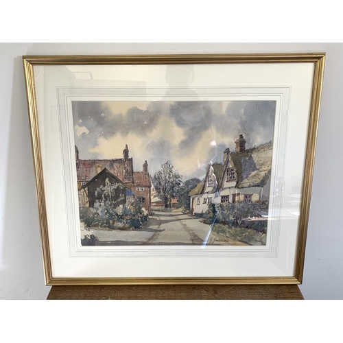 316 - J Goddard (most likely Jack Goddard 1906-1984), framed and glazed watercolour of a village street sc... 