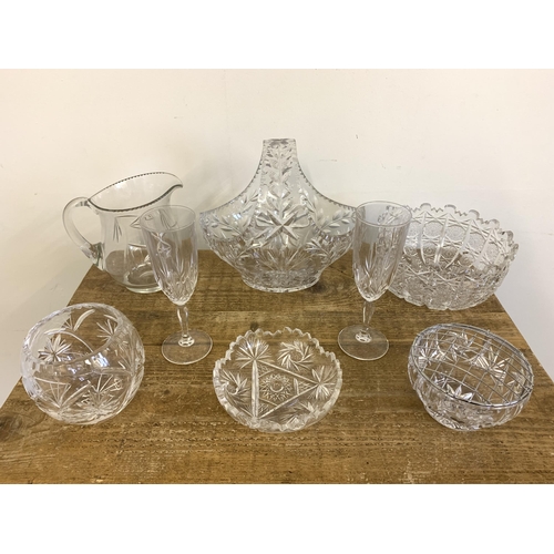 350 - A selection of good quality crystal to include a fruit bowl, basket, glasses, jug etc