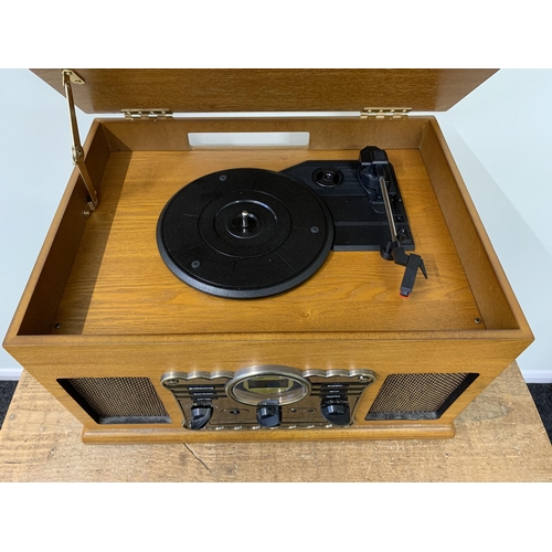 359 - A vintage style music system including radio, CD player, record deck and tape cassette player