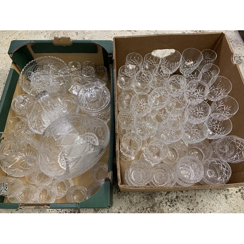 364 - Two mixed boxes of crystal glasses plus crystal jugs, biscuit barrel, candlesticks, fruit bowl etc