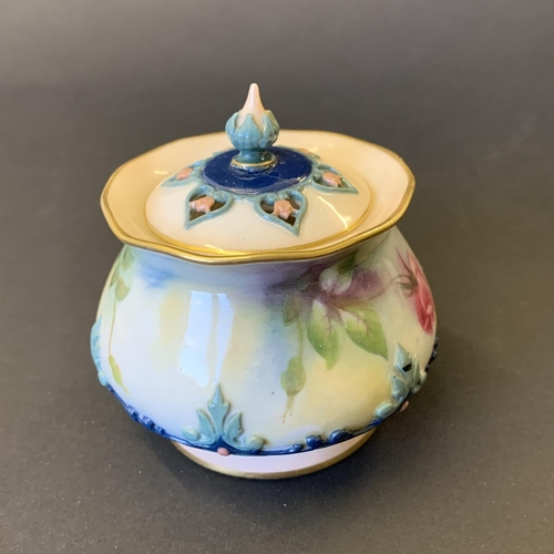 38 - A small Royal Worcester pierced lidded hand painted pot, approx. 2 3/4