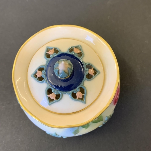 38 - A small Royal Worcester pierced lidded hand painted pot, approx. 2 3/4