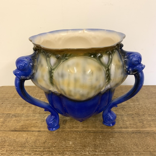 386 - A vintage jardiniere with fish head topped handle, 9 1/4