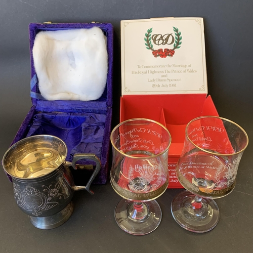 398 - A pair of boxed 1981 Royal commemorative Royal Wedding glasses plus a boxed white metal tankard