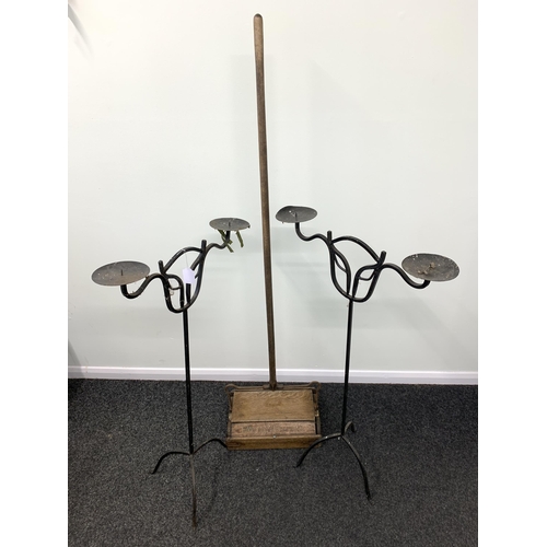 405 - Two wrought iron candlesticks, 36