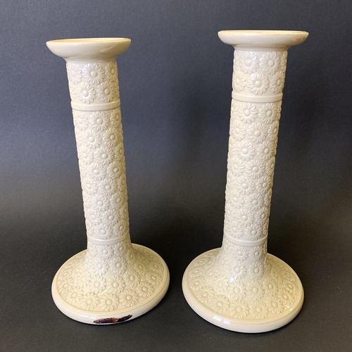 44 - A pair of 19th Century Creamware candlesticks, marked to base '471' and '9IN', stands approx. 9