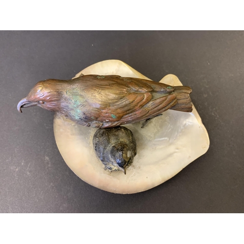 49 - A vintage cold painted bronze figure group of two birds, Crossbill and chick, both set into a mother... 