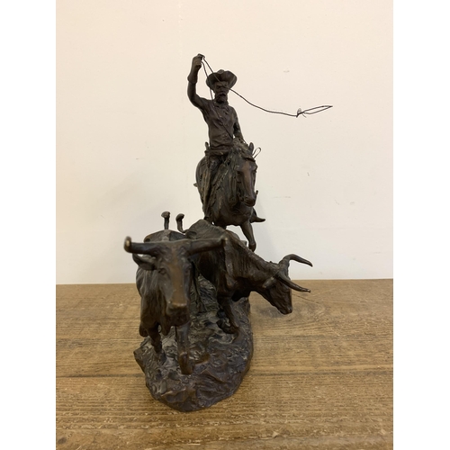 51 - C M Russell (Charles Marion Russell 1864-1926 'The Cowboy Artist'), a large and very heavy bronze fi... 