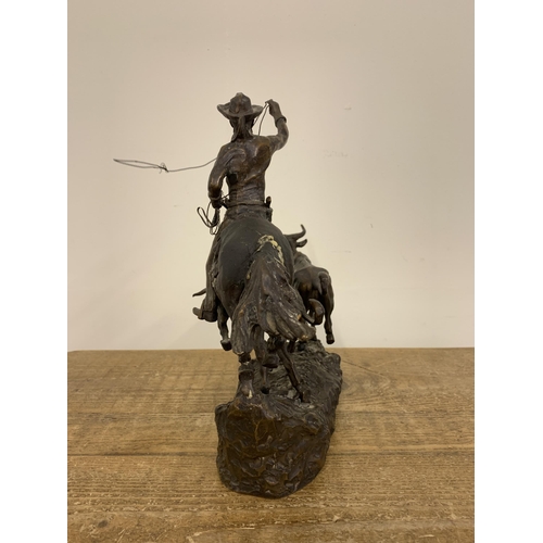 51 - C M Russell (Charles Marion Russell 1864-1926 'The Cowboy Artist'), a large and very heavy bronze fi... 