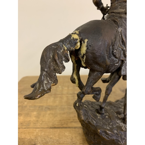 51 - C M Russell (Charles Marion Russell 1864-1926 'The Cowboy Artist'), a large and very heavy bronze fi... 