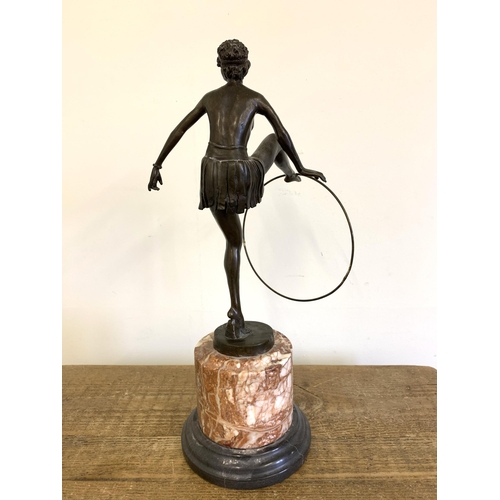 52 - After D Alonzo, an Art Deco style bronze of a female hoop dancer, impressed mark D.Alonzo with found... 