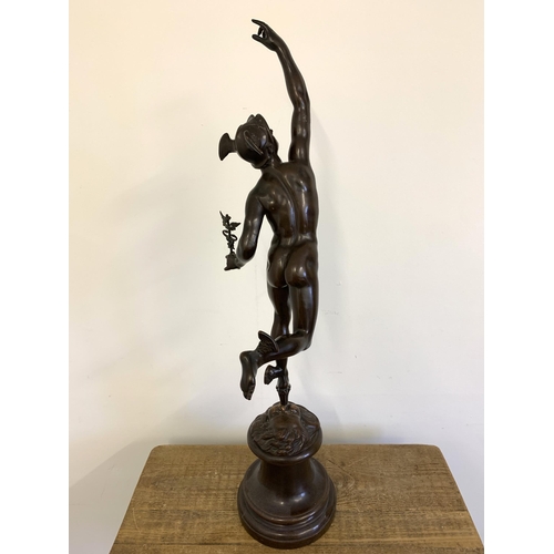 53 - A large bronze effect vintage statue of the God Hermes, approx. 34 1/2