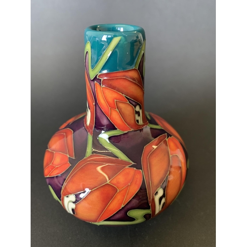 6 - A Moorcroft squat vase in the 'Tulip Stars' pattern, dated 2009, approx. 4