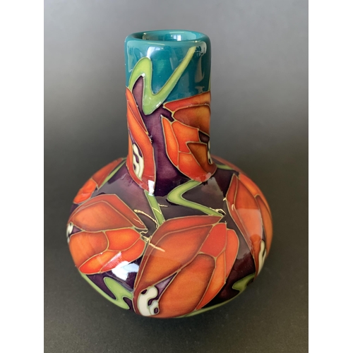 6 - A Moorcroft squat vase in the 'Tulip Stars' pattern, dated 2009, approx. 4