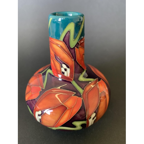 6 - A Moorcroft squat vase in the 'Tulip Stars' pattern, dated 2009, approx. 4