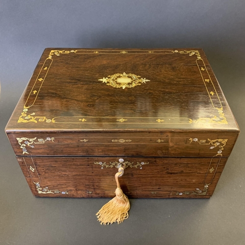 61 - A Victorian ladies travelling vanity/dressing box, inlaid with mother of pearl and over gilding, the... 