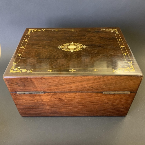 61 - A Victorian ladies travelling vanity/dressing box, inlaid with mother of pearl and over gilding, the... 