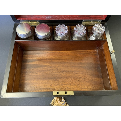 61 - A Victorian ladies travelling vanity/dressing box, inlaid with mother of pearl and over gilding, the... 