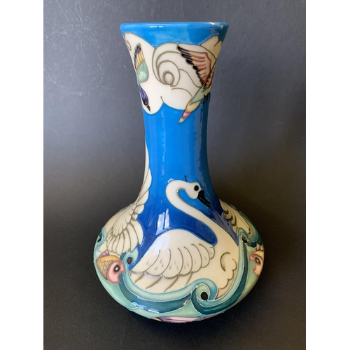 66 - A Moorcroft limited edition vase in the 'Odyssey Swans' pattern by Beverley Wilkes, No.203/500, date... 