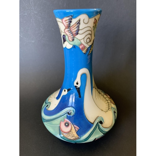 66 - A Moorcroft limited edition vase in the 'Odyssey Swans' pattern by Beverley Wilkes, No.203/500, date... 