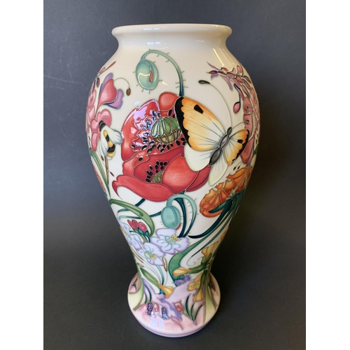 70 - A Moorcroft Trial vase in the 'Family Through Flowers' pattern by Emma Bossons, marked 'Trial 16.05.... 