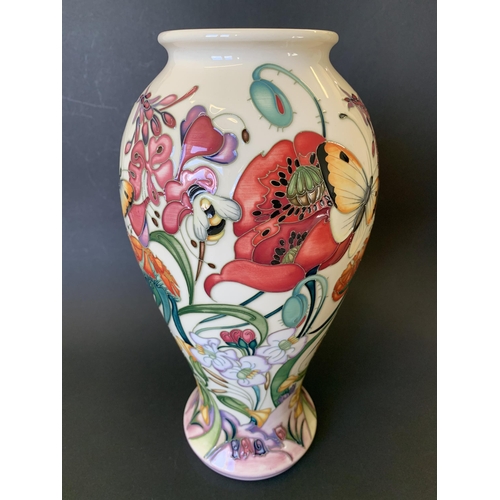 70 - A Moorcroft Trial vase in the 'Family Through Flowers' pattern by Emma Bossons, marked 'Trial 16.05.... 