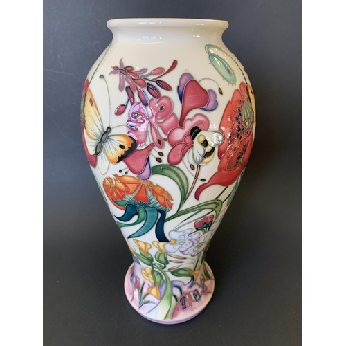 70 - A Moorcroft Trial vase in the 'Family Through Flowers' pattern by Emma Bossons, marked 'Trial 16.05.... 