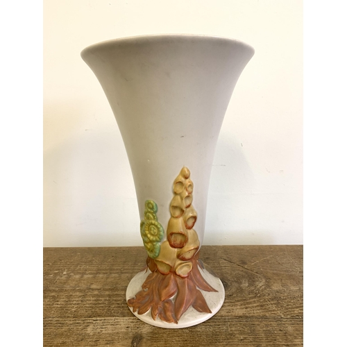 78 - A large Clarice Cliff trumpet vase in the 'Garden' pattern, 12