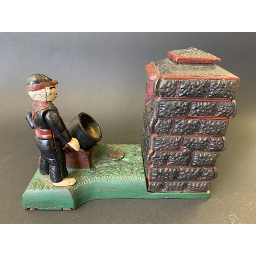 80 - A vintage cast iron and hand painted 'Artillery Bank' money box in working condition, 7 1/2