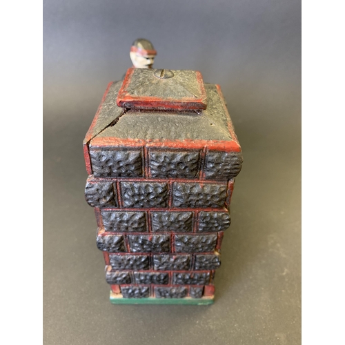 80 - A vintage cast iron and hand painted 'Artillery Bank' money box in working condition, 7 1/2