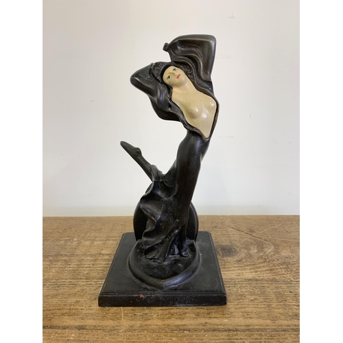 82 - After J B Hirsch, an Art Deco bronze style figurine of a dancer, 10 3/4